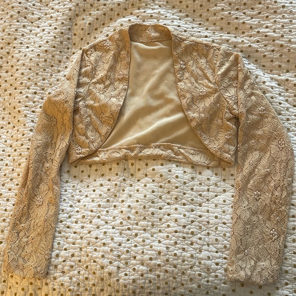 Elegant beige shrug perfect for formal events